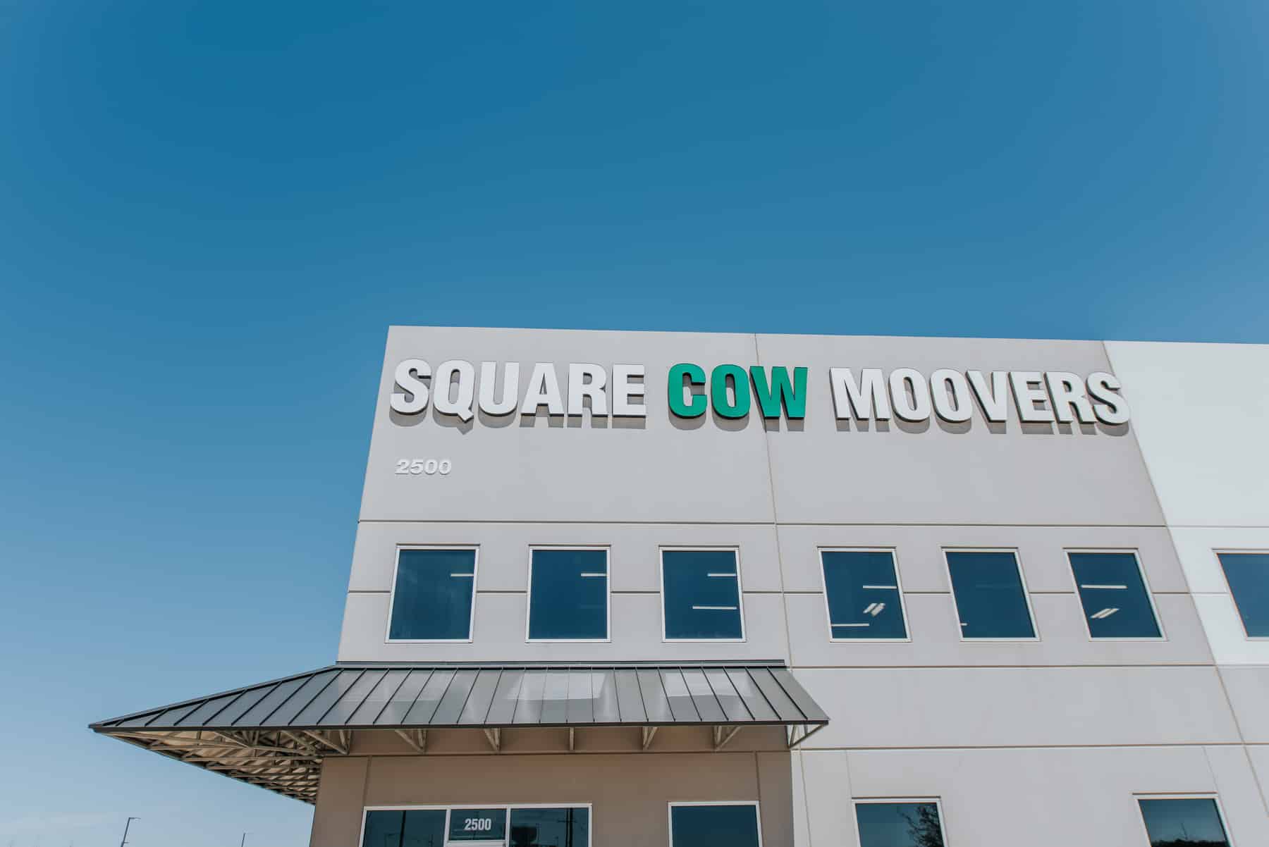 Square Cow Movers building exterior with company signage