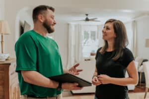 Square Cow Movers employee speaking with a customer