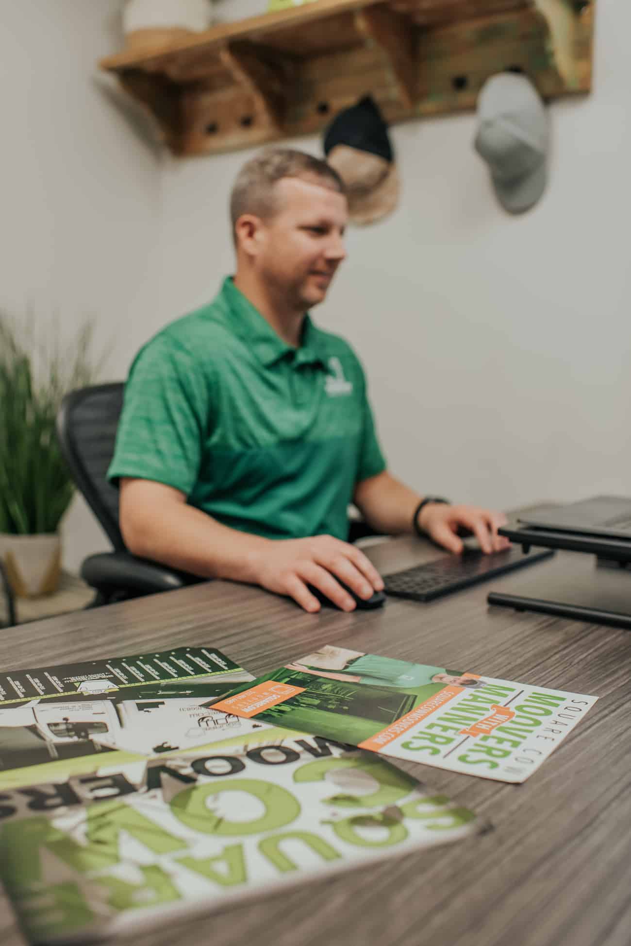 Square Cow Movers team member working at desk